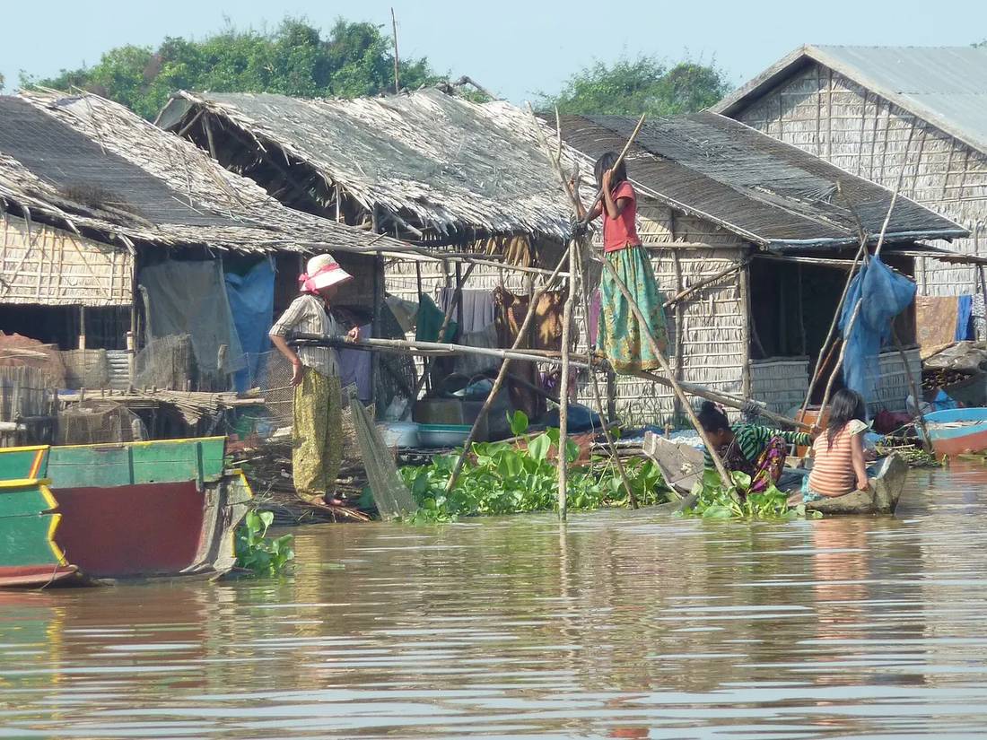 Tonle Sap Cambodia floating village homestay eco-tourism — book via IMPT