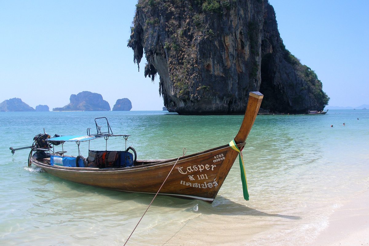 Railay Krabi Thailand limestone cliffs eco-tourism — book Krabi eco-stays via IMPT